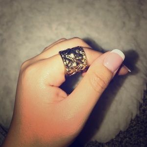 Woven, intricate gold ring